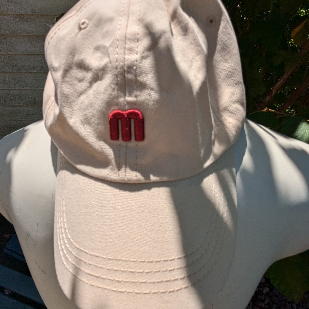 Never Worn Merrell Beige Adjustable back baseball cap.